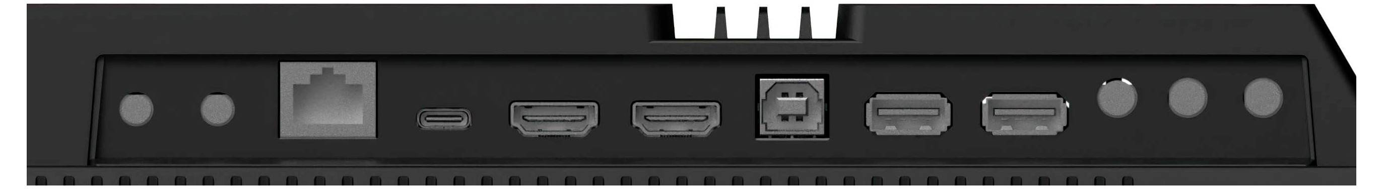 Das Bild zeigt die Rückseite eines grauen Computermonitors auf einem Ständer. Es zeigt den Markennamen 