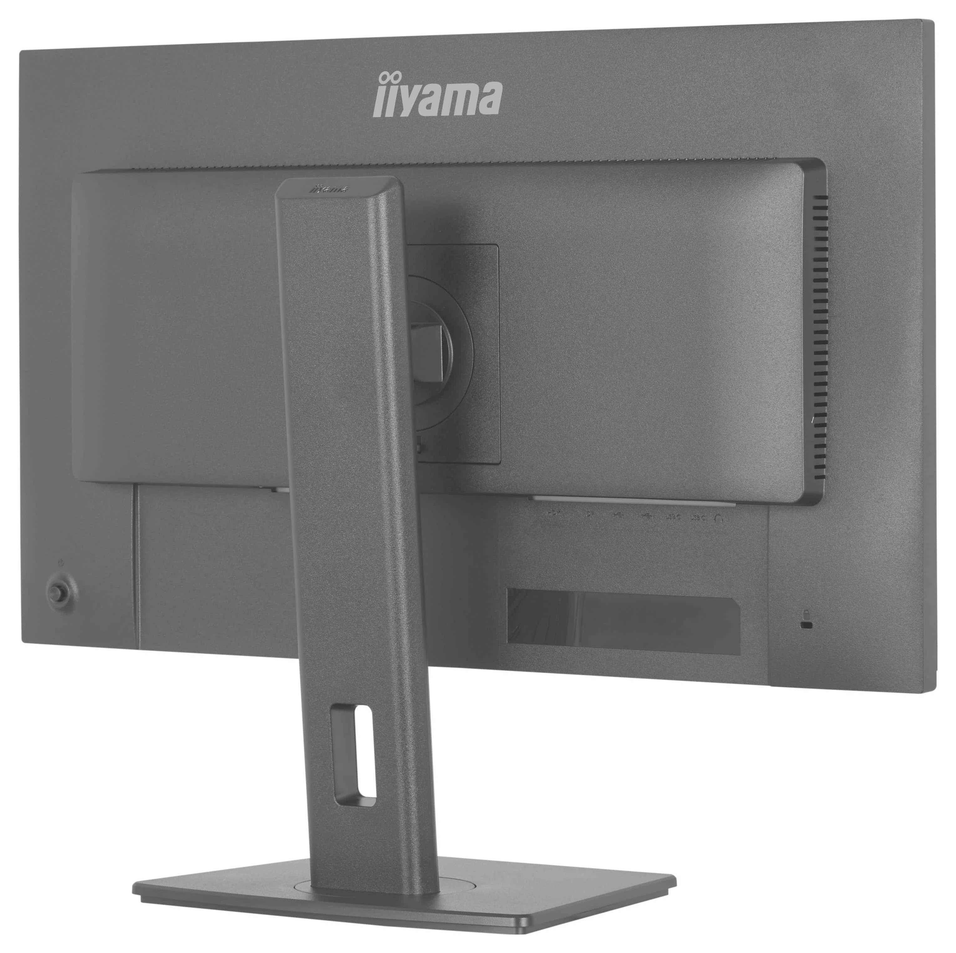Ein Computermonitor mit einem robusten rechteckigen Standfuß und einem schlichten Rückseiten-Design, auf dem oben in der Mitte die Marke 
