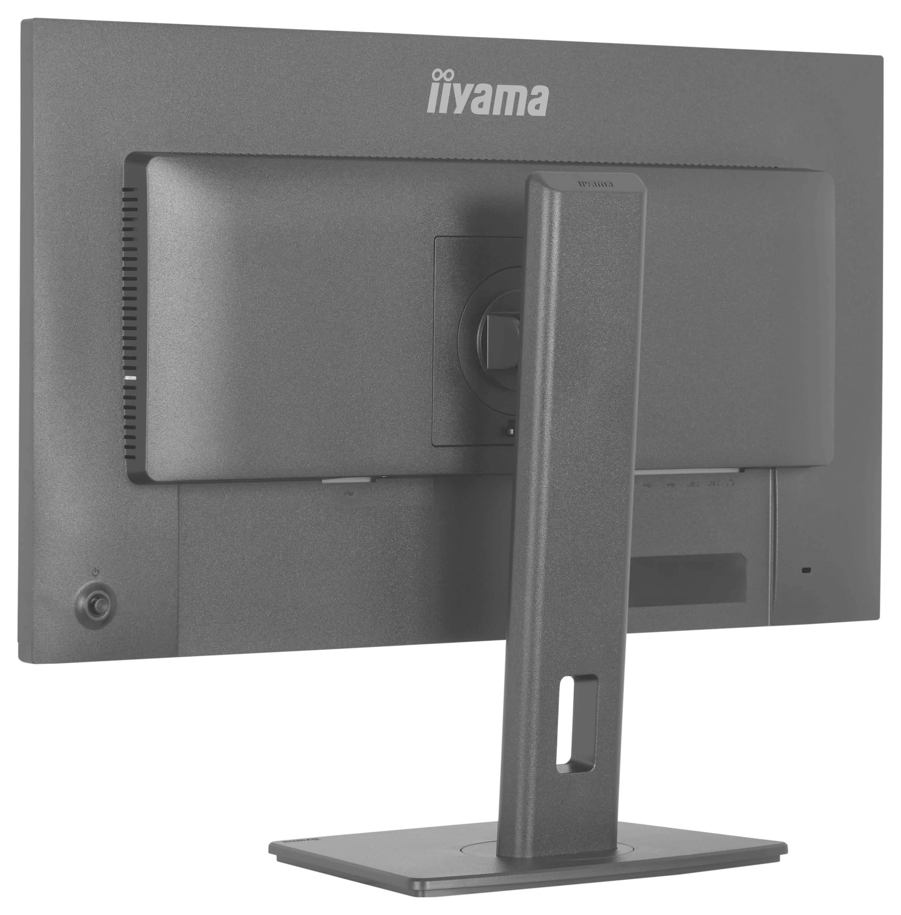 Ein grauer Computermonitor von hinten gesehen, stehend auf einem rechteckigen Sockel mit dem Markennamen auf der oberen Rückseite gedruckt.