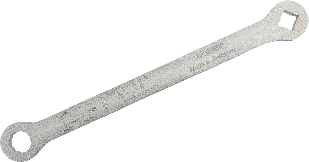 Ein metallischer Schraubenschlüssel mit Messskalen und eingraviertem Text „Made in Germany