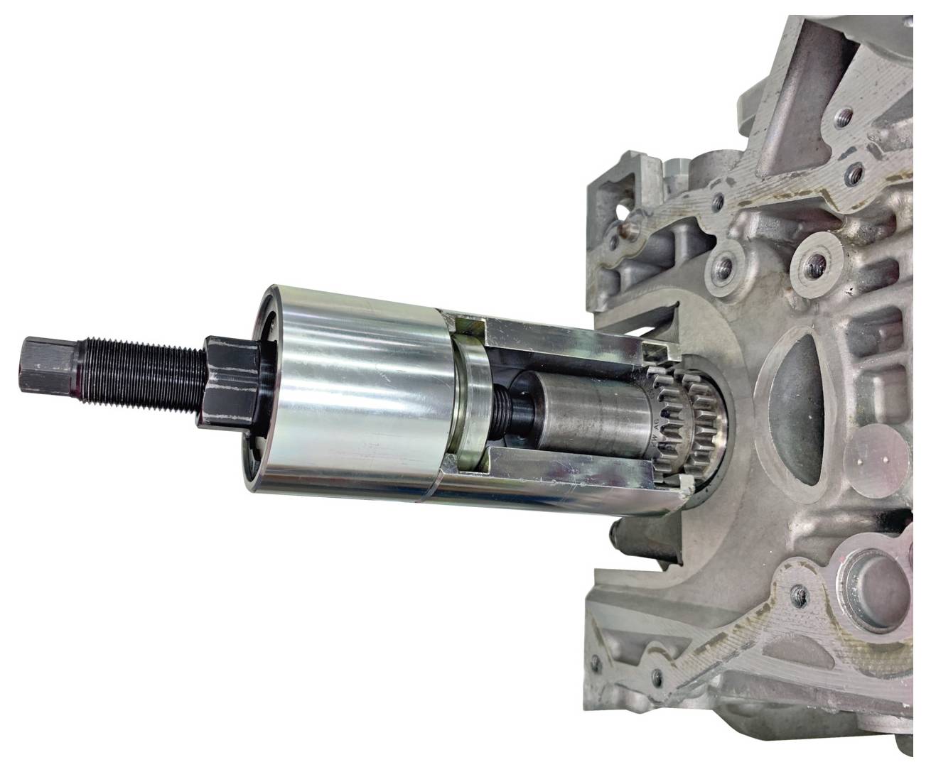 Eine Querschnittsansicht einer metallischen mechanischen Zahnradanordnung, die interne Komponenten und strukturelles Design in einem technischen Kontext zeigt.