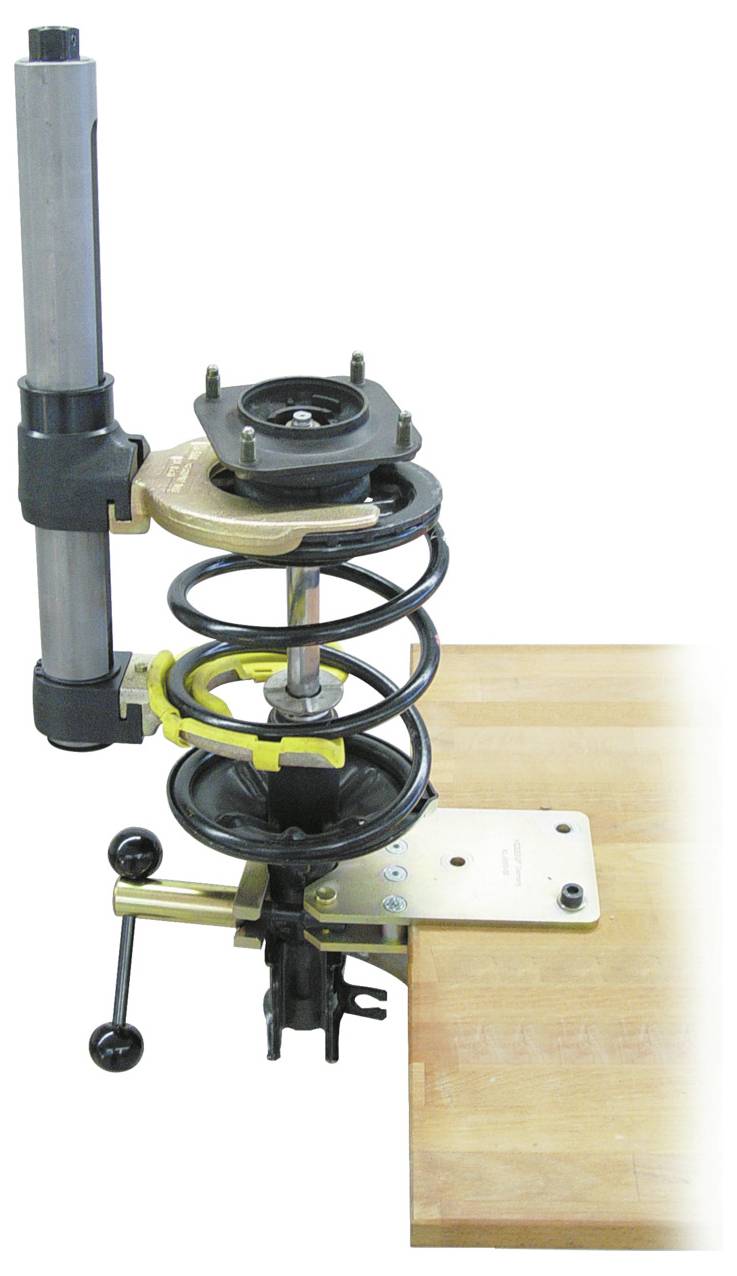 Gerät, das eine auf der Kante eines Holztisches montierte Aufhängungsfeder zeigt, mit einem vertikalen Stützstab und verstellbaren Komponenten.