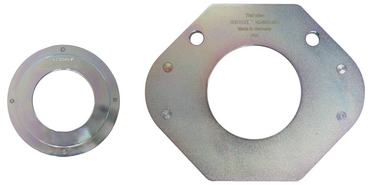 Zwei kreisförmige Metallflansche; links ist kleiner, rechts hat einen achteckigen Rand mit der Aufschrift „Type Key: BEARING