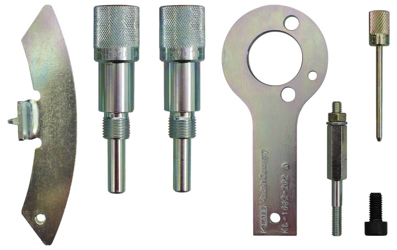 Eine schwarze L-förmige Metallstange mit einer langen geraden Seite und einem kurzen gebogenen Ende.