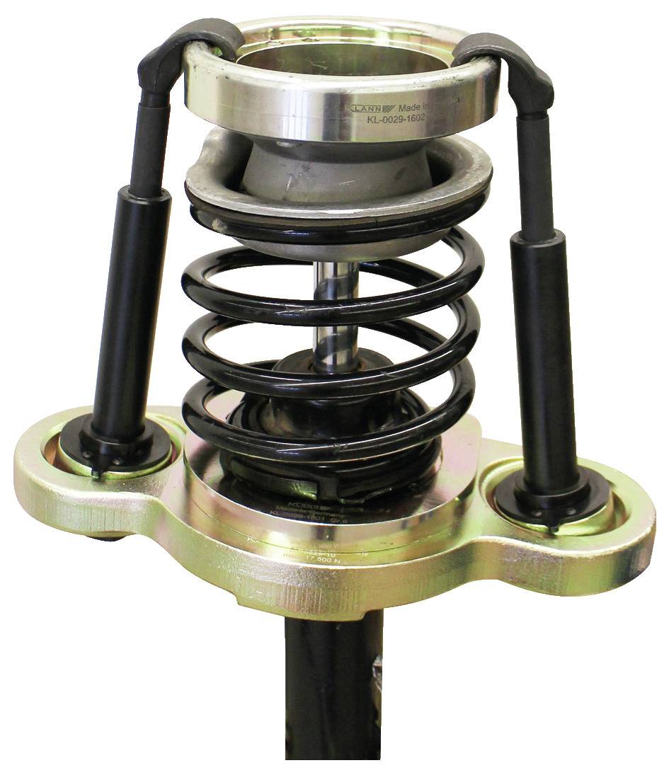 Ein Metallspannwerkzeug für Federn mit zwei Gewindestangen und Griffen, speziell konzipiert, um Automobilspiralen sicher für die Montage oder Demontage zu komprimieren.