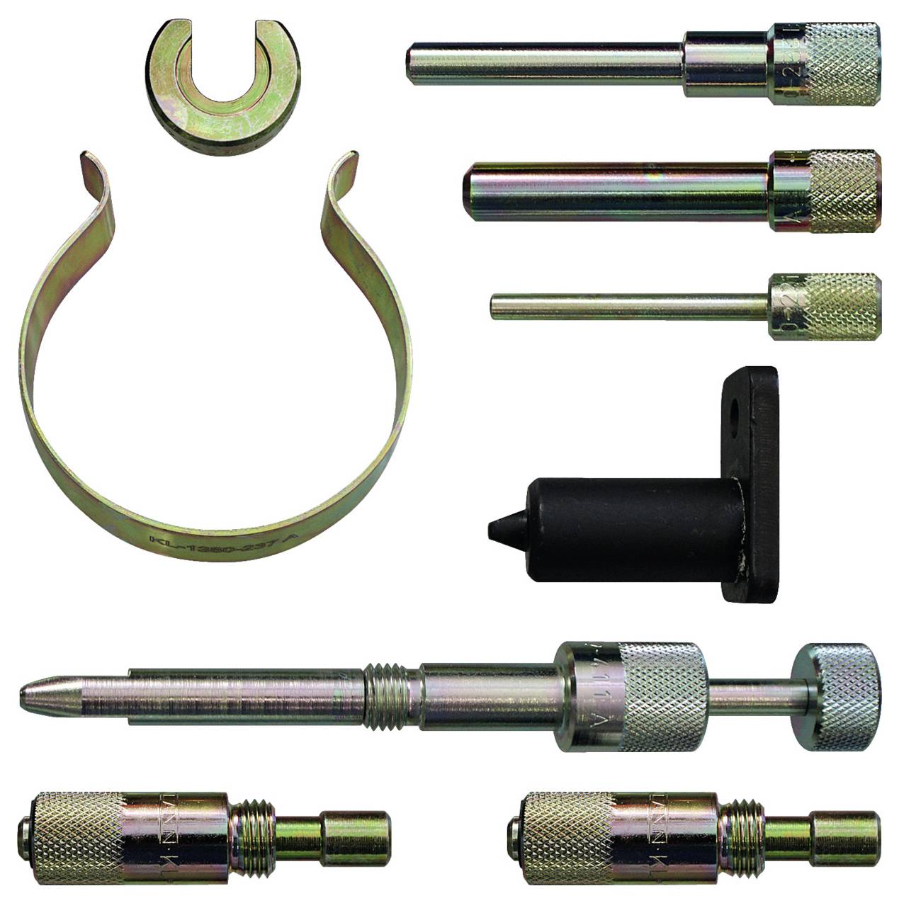 Ein Sortiment von Metallautomotivwerkzeugen, einschließlich Klemmen, Stifte und Adapter, die für die Installation und Wartung von Zahnriemen verwendet werden.