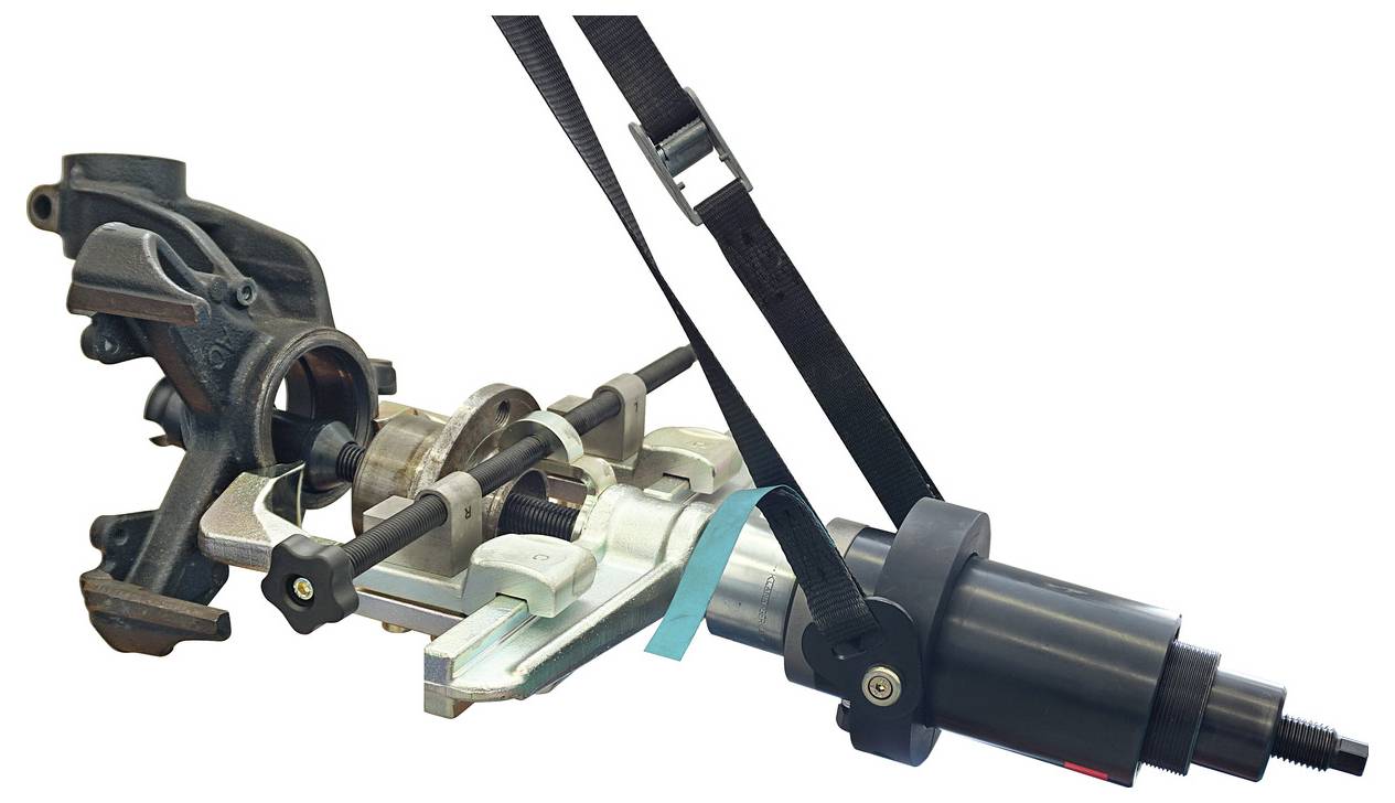 Ein mechanisches Werkzeug zum Zusammenbau oder Auseinanderbau von Aufhängungskomponenten des Fahrzeugs.