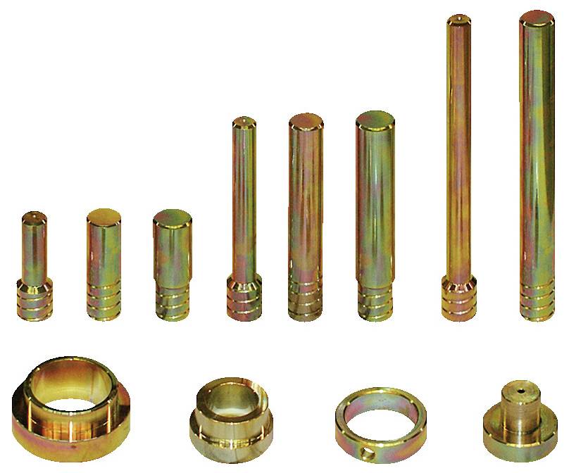 Ein Satz aus metallischen zylindrischen und ringförmigen Komponenten, die in Höhe und Größe unterschiedlich sind und wahrscheinlich in mechanischen Baugruppen verwendet werden.