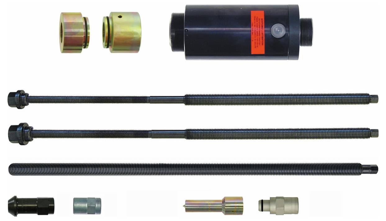 Ein Hydraulik-Abzugset mit verschiedenen Gewindestangen, Kupplungen und einem zentralen Hydraulikzylinder, das zum Ziehen oder Drücken von Komponenten verwendet wird.
