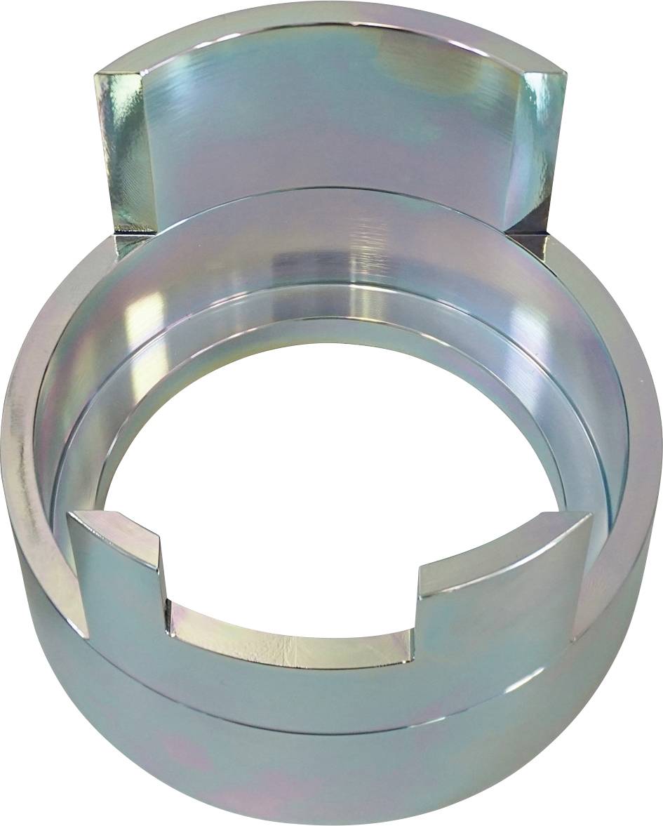 Ein zylindrisches Metallobjekt mit gezackter Oberseite, das mehrfarbiges Licht reflektiert und einem in mechanischen Anwendungen verwendeten Bauteil oder Werkzeug ähnelt.