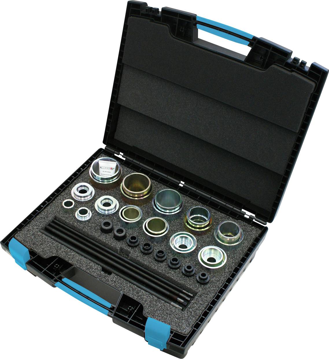 Eine lange, schwarze, wellpappe Walze mit metallischen Enden, wahrscheinlich ein Teil einer Maschinen- oder Industrieausrüstungskomponente.