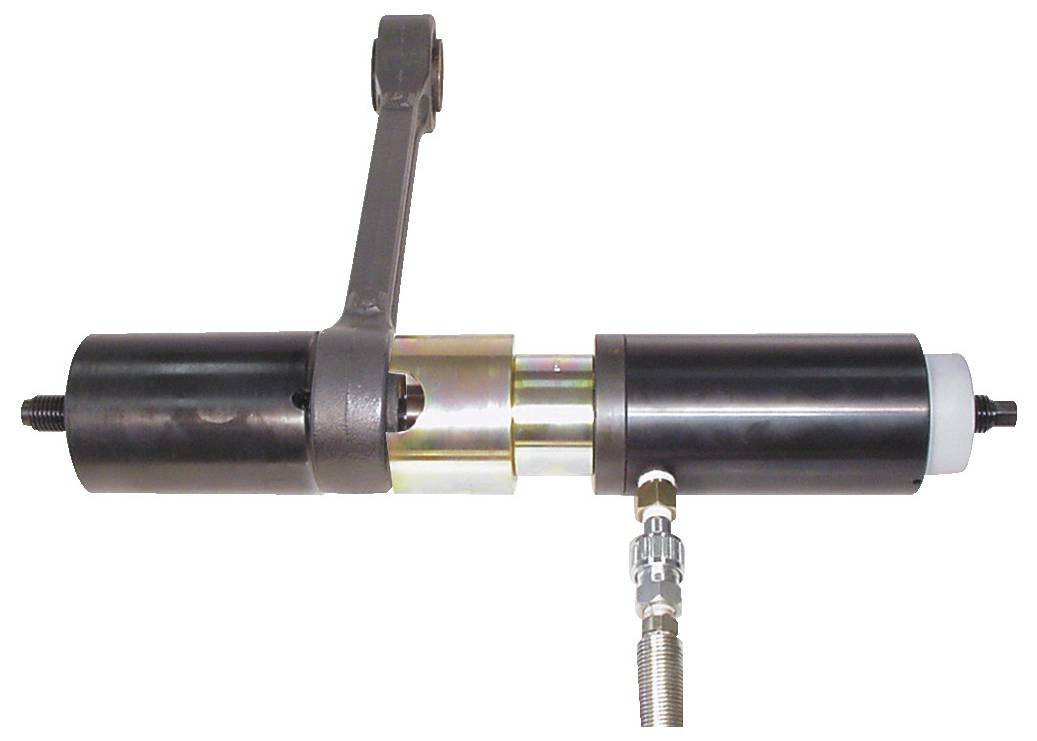 'Telehandler-Seitenverschubzylinder': Das Bild zeigt einen industriellen Hydraulikzylinder mit einer Armanbringung, der wahrscheinlich zur Positionierung von Ausrüstung verwendet wird.