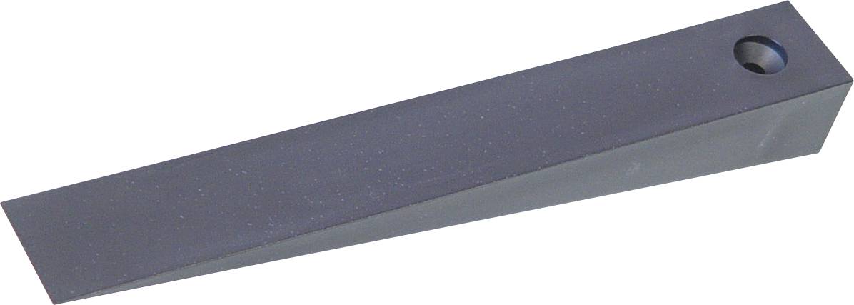 Ein großes, zylindrisches schwarzes Objekt mit einer Kerbe an der Oberseite, wahrscheinlich als mechanische Komponente oder Stützwerkzeug verwendet.