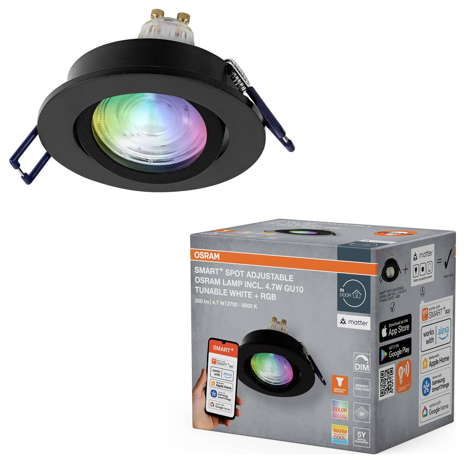 Stilvolles modernes Badezimmer mit grauen Fliesen, großer Badewanne unter geneigter Decke, eleganten Holzschränken, doppelten Waschbecken und eingelassener Beleuchtung.