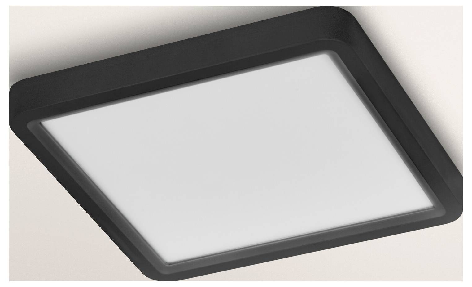 Eine quadratische LED-Deckenleuchte mit schwarzem Rahmen und minimalem Design, montiert an einer hellgefärbten Decke.