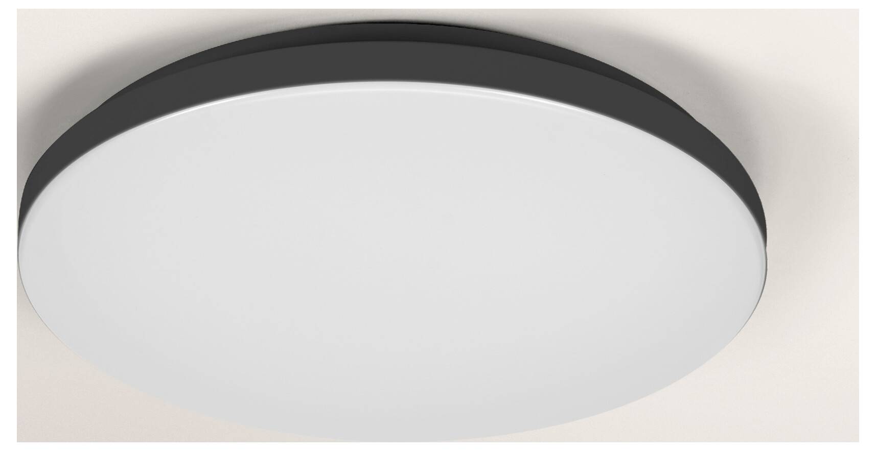 Ein langer, zylindrischer LED-Lichtbalken mit schwarzem Gehäuse, horizontal an einer hellen Wand montiert.