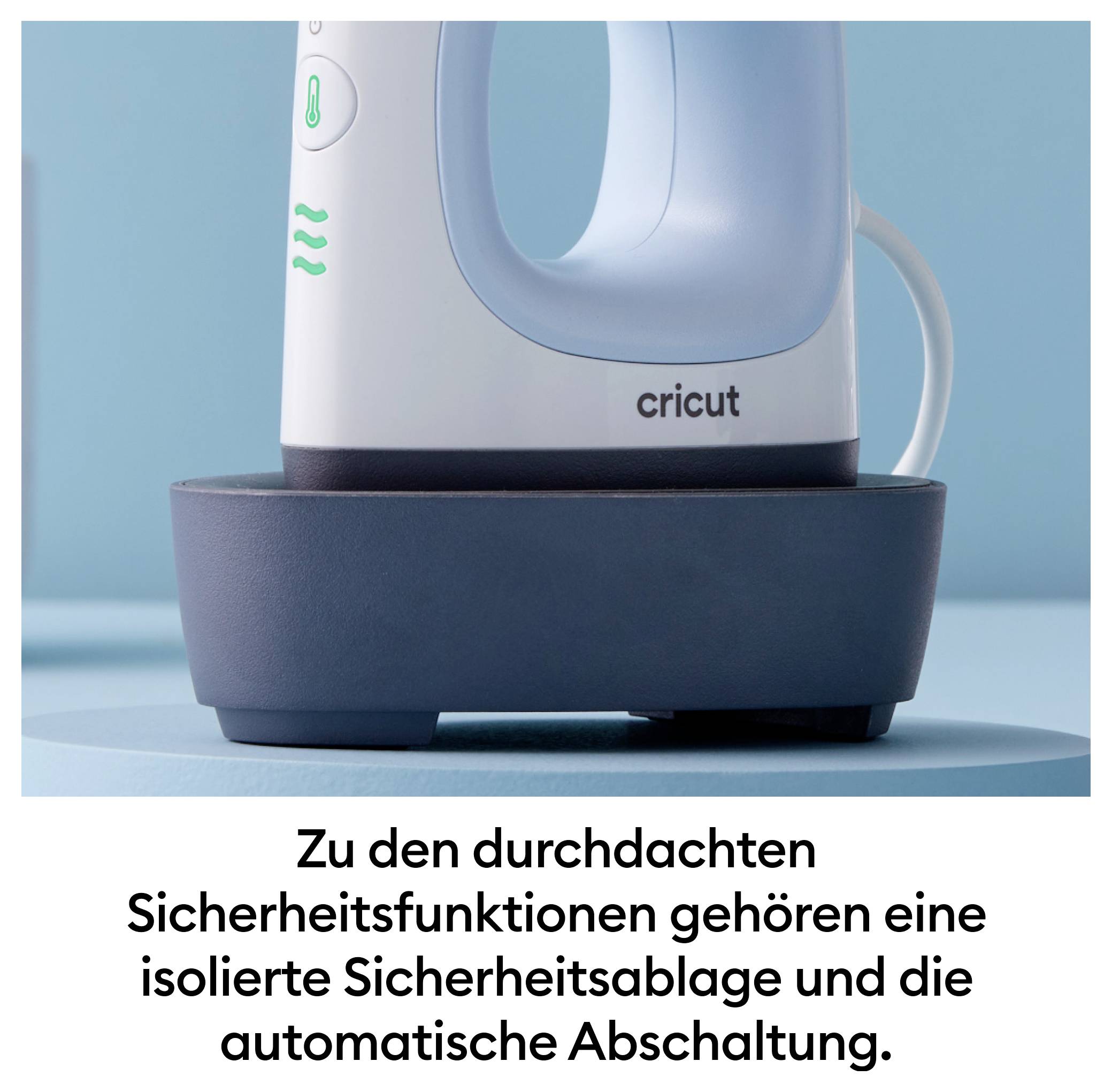 Ein Bügeleisen auf einer grauen Basis mit der Aufschrift 'cricut'. Der Text darunter erläutert Sicherheitsfunktionen des Geräts.