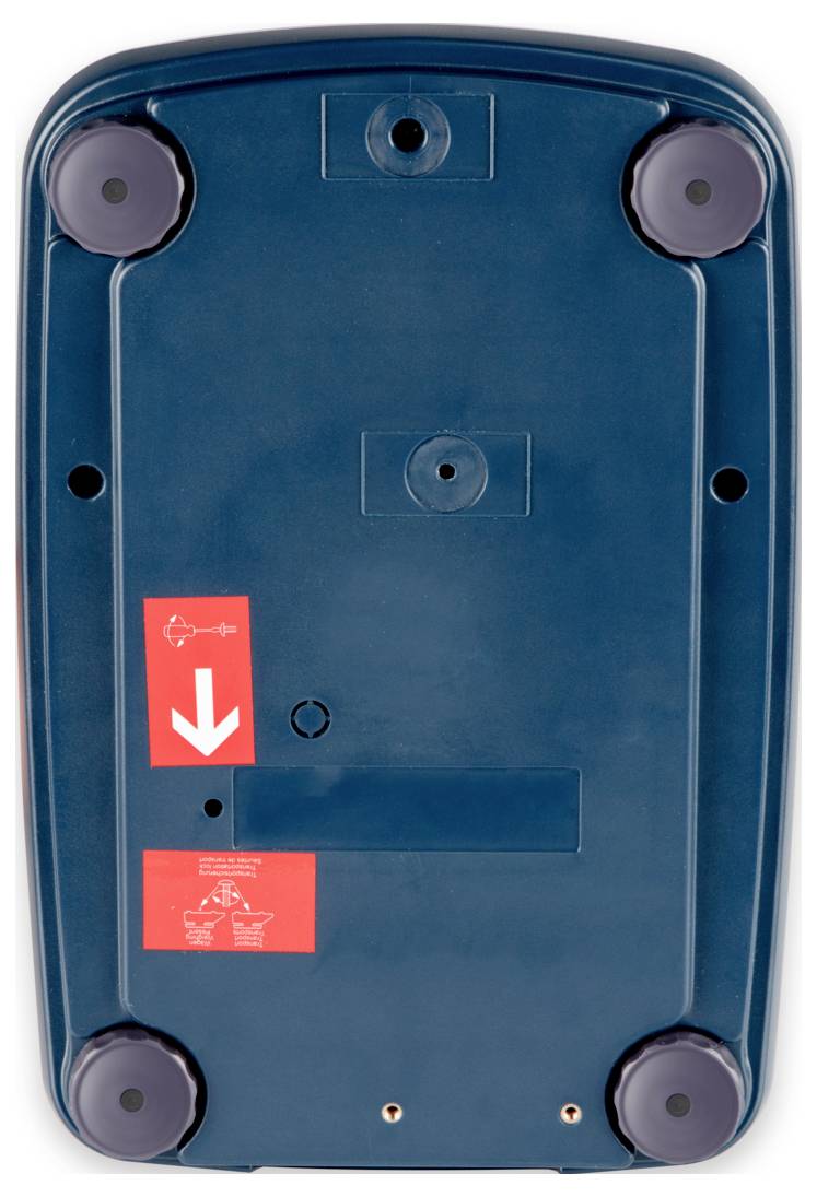 Der Boden eines rechteckigen blauen Geräts mit vier runden Füßen, das einen roten Aufkleber mit einem weißen Pfeil mit Abwärtsrichtung enthält.