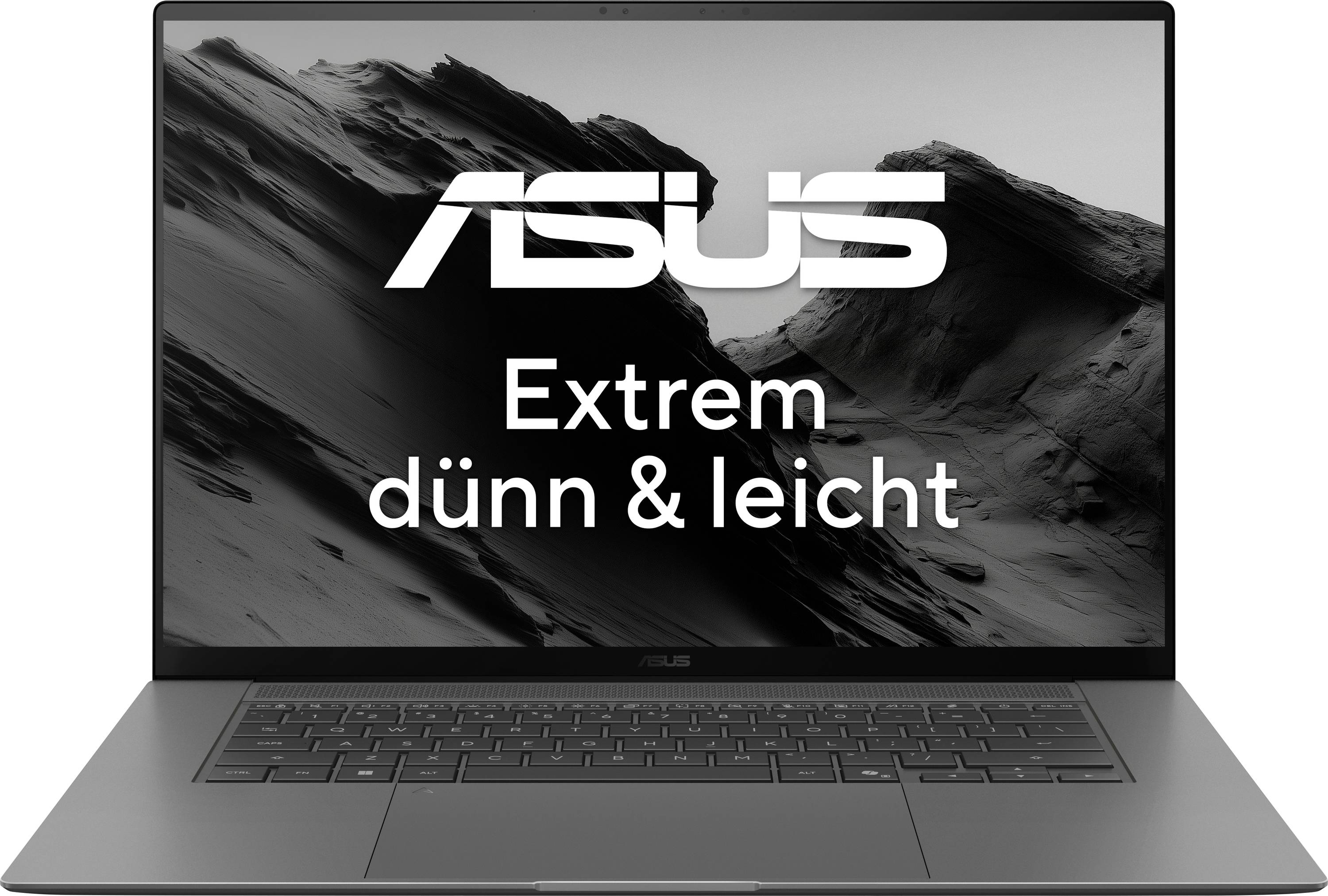 Ein Laptop mit der Aufschrift 'ASUS Extrem dünn & leicht' auf dem Bildschirm, vor einem Hintergrund aus schwarz-weißen Bergen.