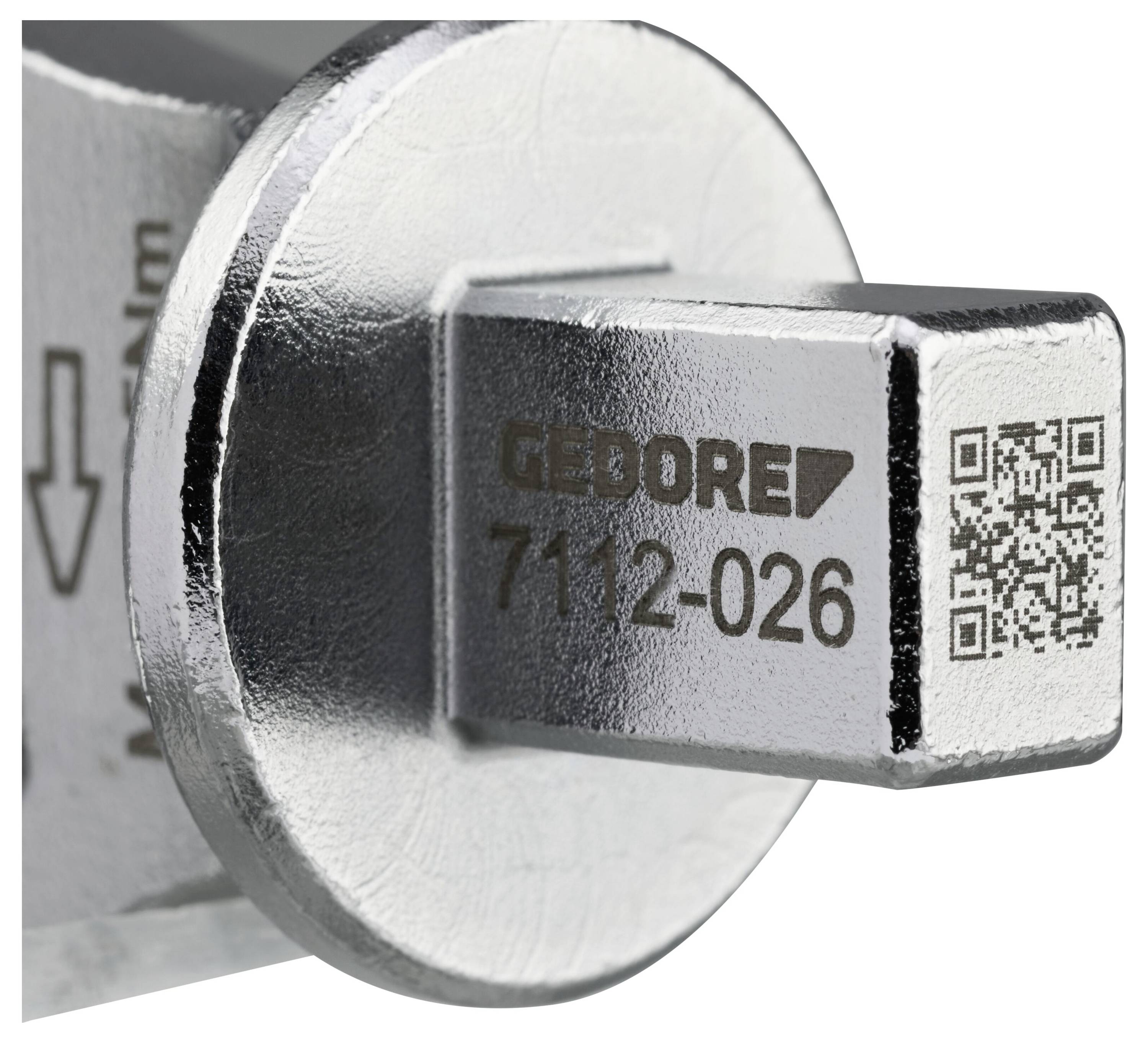 Eine Nahaufnahme eines metallischen Werkzeugs mit eingraviertem Text „GEDORE 7112-026