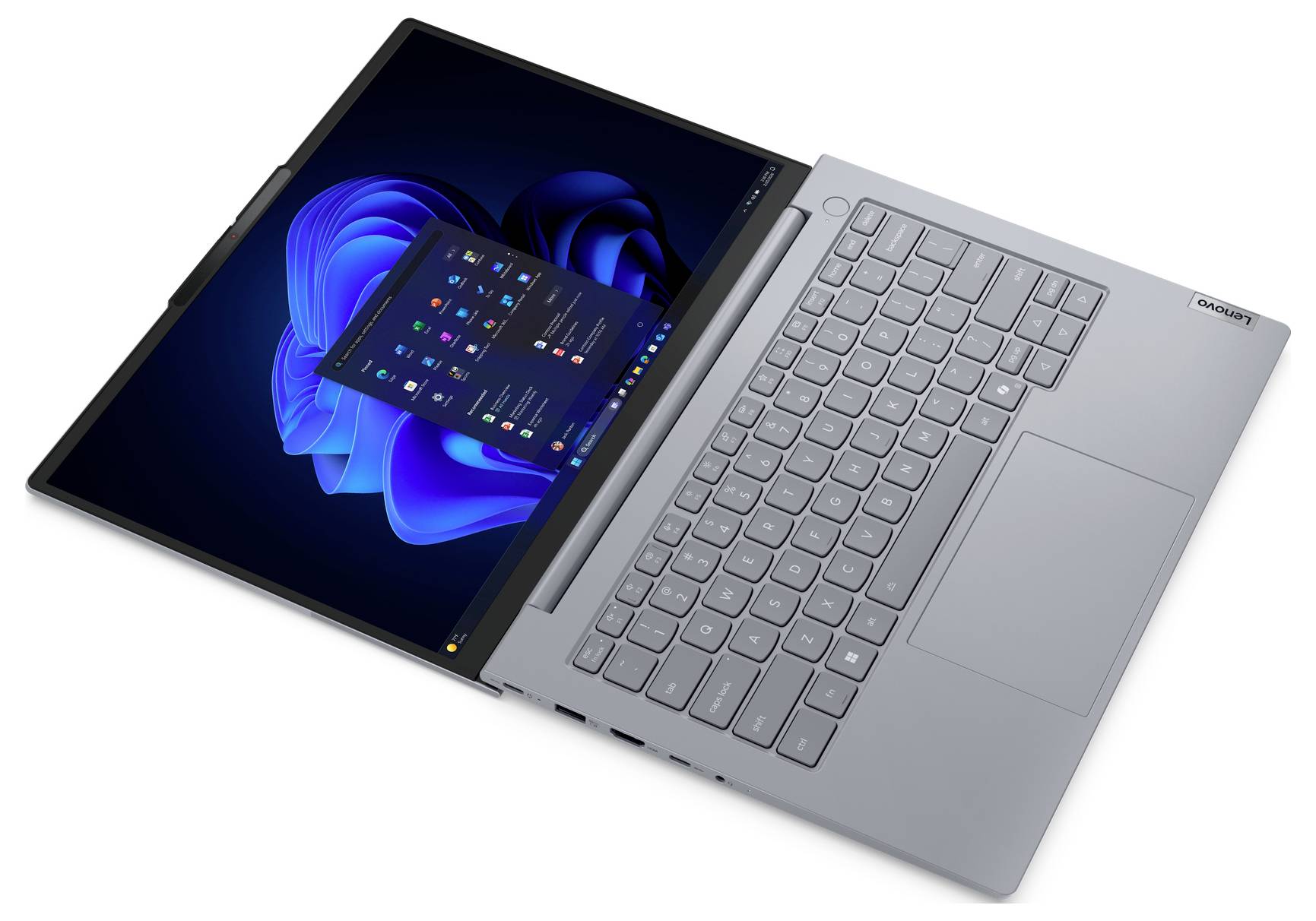 Seitenansicht der linken Kante eines Laptops mit Anschlüssen, einschließlich eines Kartensteckplatzes, eines USB-Anschlusses und einer Audiobuchse.