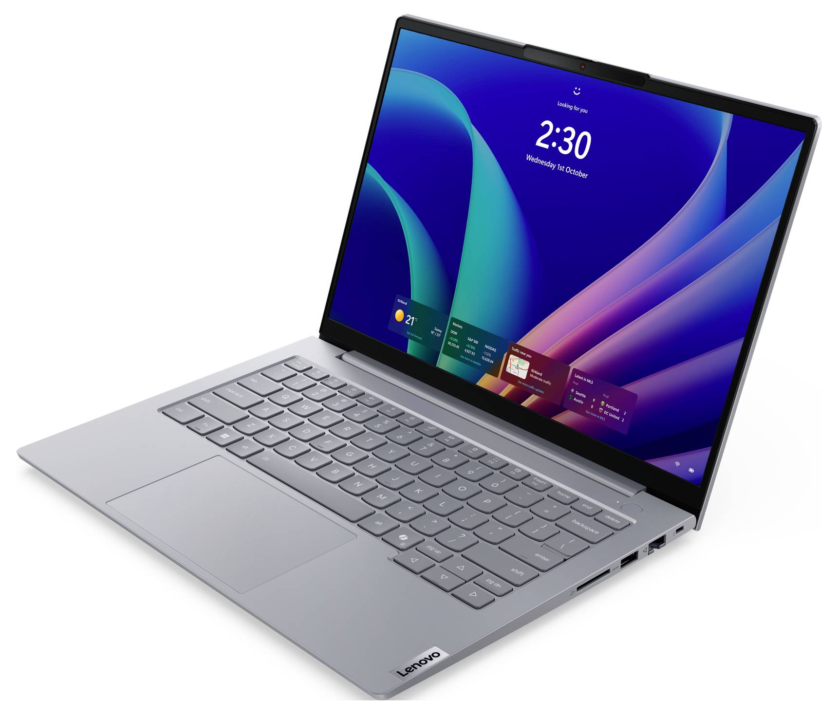 Silberner Lenovo-Laptop unter einem Winkel geöffnet, zeigt einen farbenfrohen Windows-ähnlichen Startbildschirm auf dem Display.