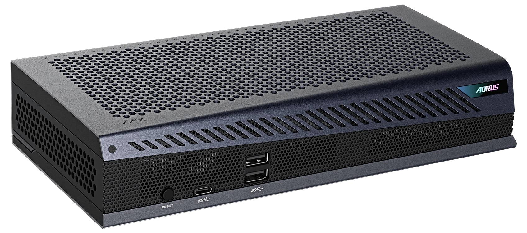 Ein kompaktes rechteckiges elektronisches Gerät mit Belüftungslöchern oben und an der Vorderseite, ausgestattet mit USB-Anschlüssen, einem Ein-/Ausschalter und einem RGB-beleuchteten Logo.