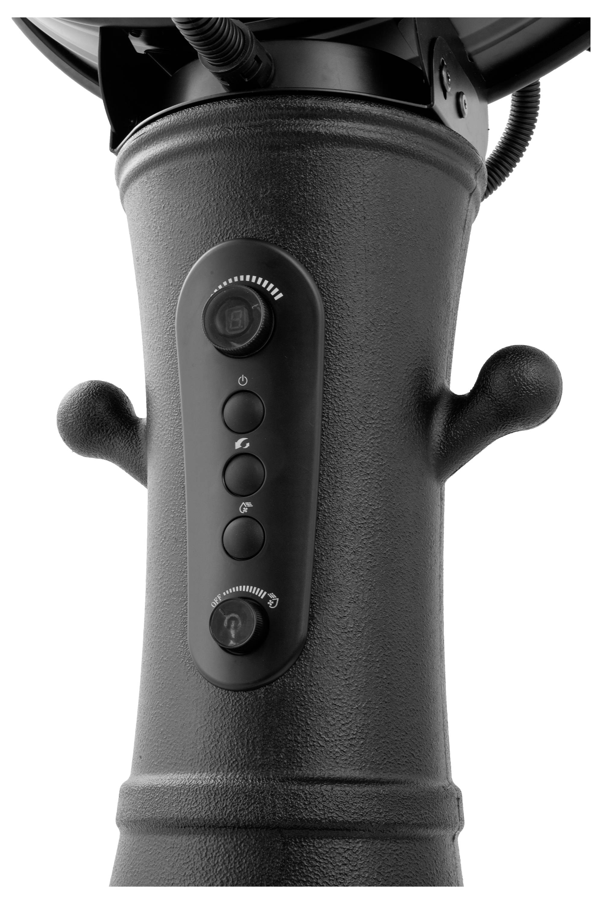 Ein schwarzes zylindrisches Gerät mit vier Tasten und einem Drehregler auf der Vorderseite, wahrscheinlich Teil eines Haushaltsgeräts oder einer Maschine mit strukturierter Oberfläche.