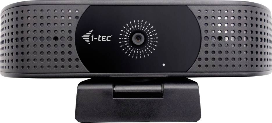 Eine schwarze i-tec Webcam mit einer Linse in der Mitte, umgeben von Mikrofon-Löchern, montiert auf einer Klammer, verwendet für Videoanrufe oder Streaming.