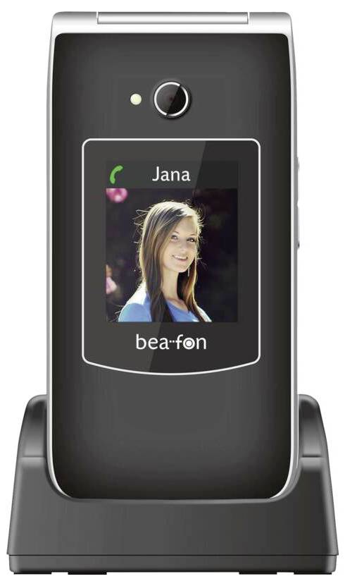 Ein Klapphandy in einer Dockingstation zeigt einen Kontakt namens „Jana