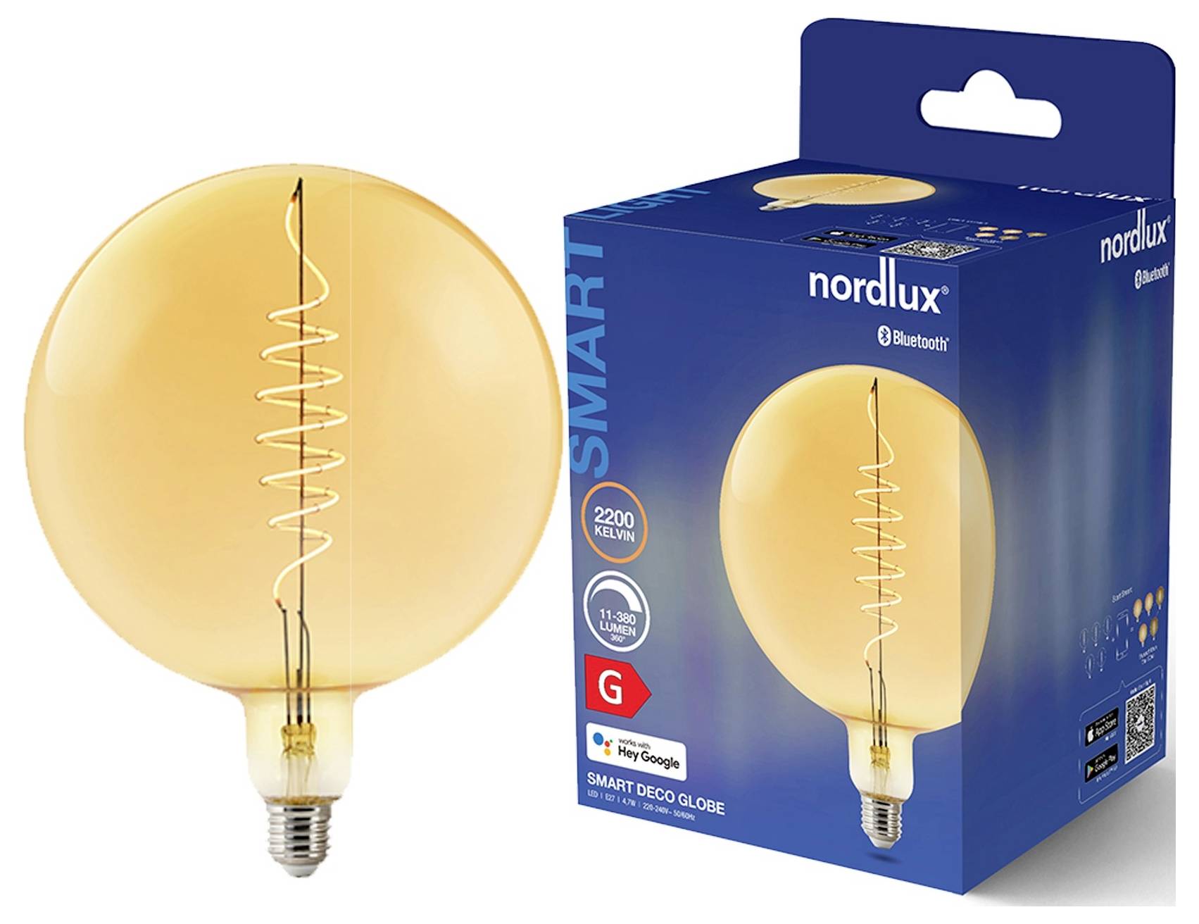 Bernsteinfarbige Glühbirne mit sichtbarem Glühdraht neben ihrer blauen Einzelhandelsverpackung 