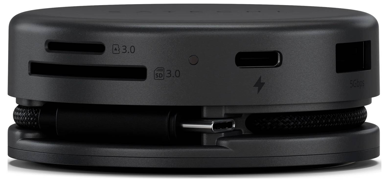 Ein elegantes, schwarzes, rundes Gerät mit mehreren Anschlüssen, einschließlich USB-C, USB 3.0 und SD-Kartenschacht, entwickelt für Konnektivität und Laden.