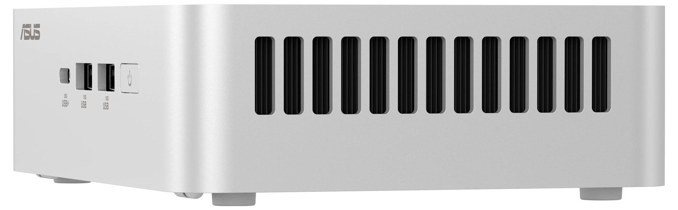 Ein silberner ASUS Mini-PC mit Belüftungsschlitzen und USB-Anschlüssen auf der Vorderseite.