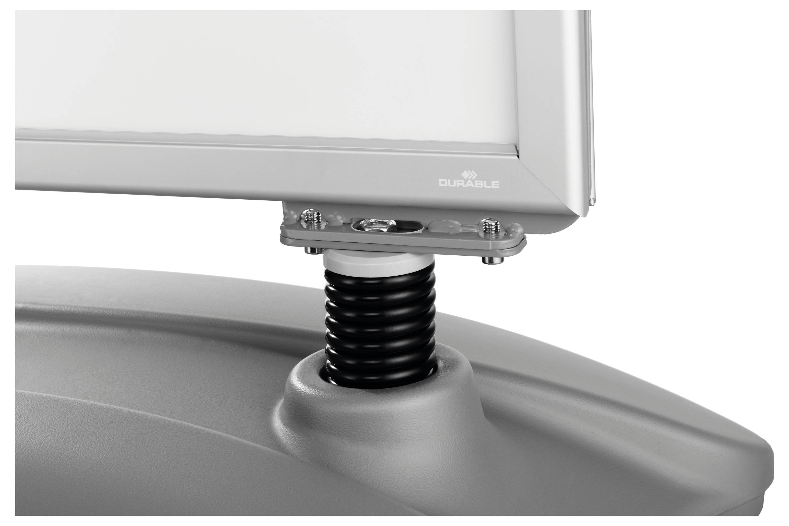 Eine Nahaufnahme eines Monitorständers mit einem an einer Basis befestigten Federmechanismus, entwickelt für Langlebigkeit und ergonomische Unterstützung.