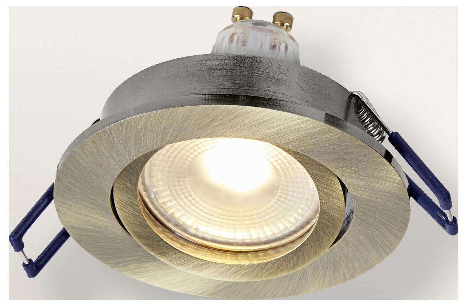 Ein Smartphone zeigt einen lila und weißen abstrakten Hintergrund mit blütenblattähnlichen Formen.