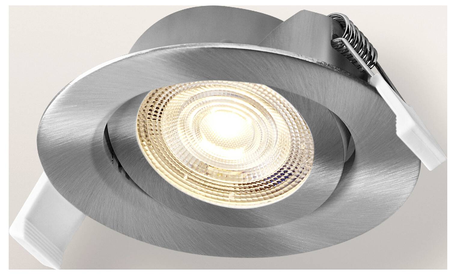 Ein Baustrahler-Akkupanel mit dreieckigem Ständerdesign, neben seiner Verpackung abgebildet. Die Schachtel hebt Merkmale wie die IP54-Bewertung und 700 Lumen hervor.