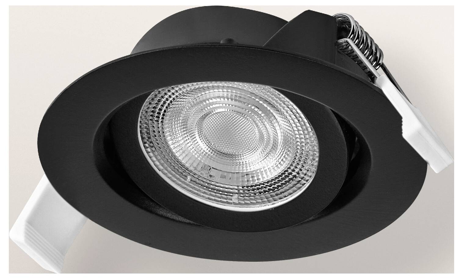 Eingelassene schwarze Deckenleuchte mit kreisförmigem Design und detaillierter Linse in der Mitte.