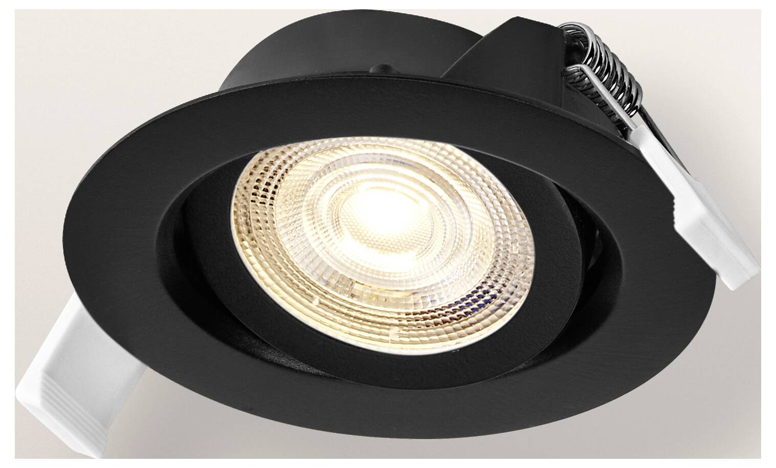 Ein schwarzes, eingelassenes Deckenleuchte mit sichtbarem Leuchtmittel, entworfen für moderne Innenräume.