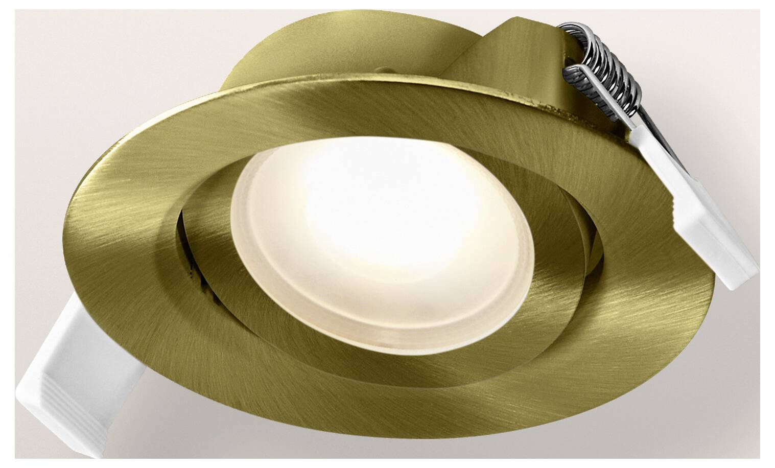 Eine Einbauleuchte mit Messingoberfläche und weißem Leuchtmittel, entworfen für moderne Innenräume.