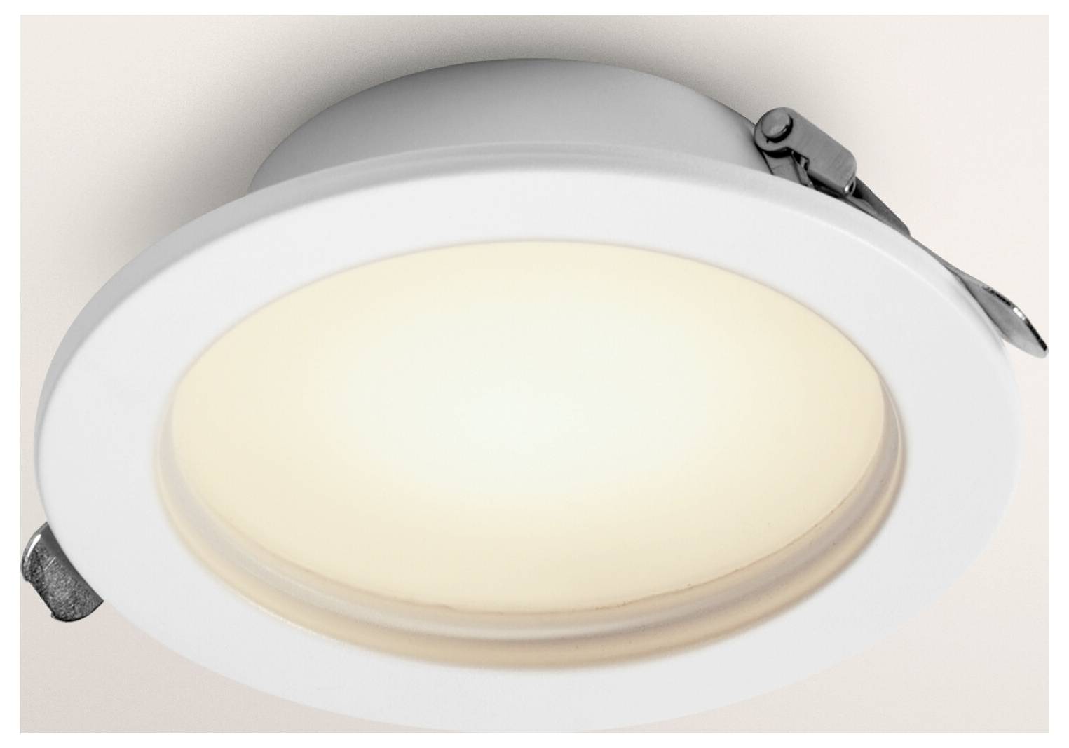 Runde, in der Decke versenkte Leuchte mit weißer Fassung und leuchtendem Mittelteil, in der Decke montiert.