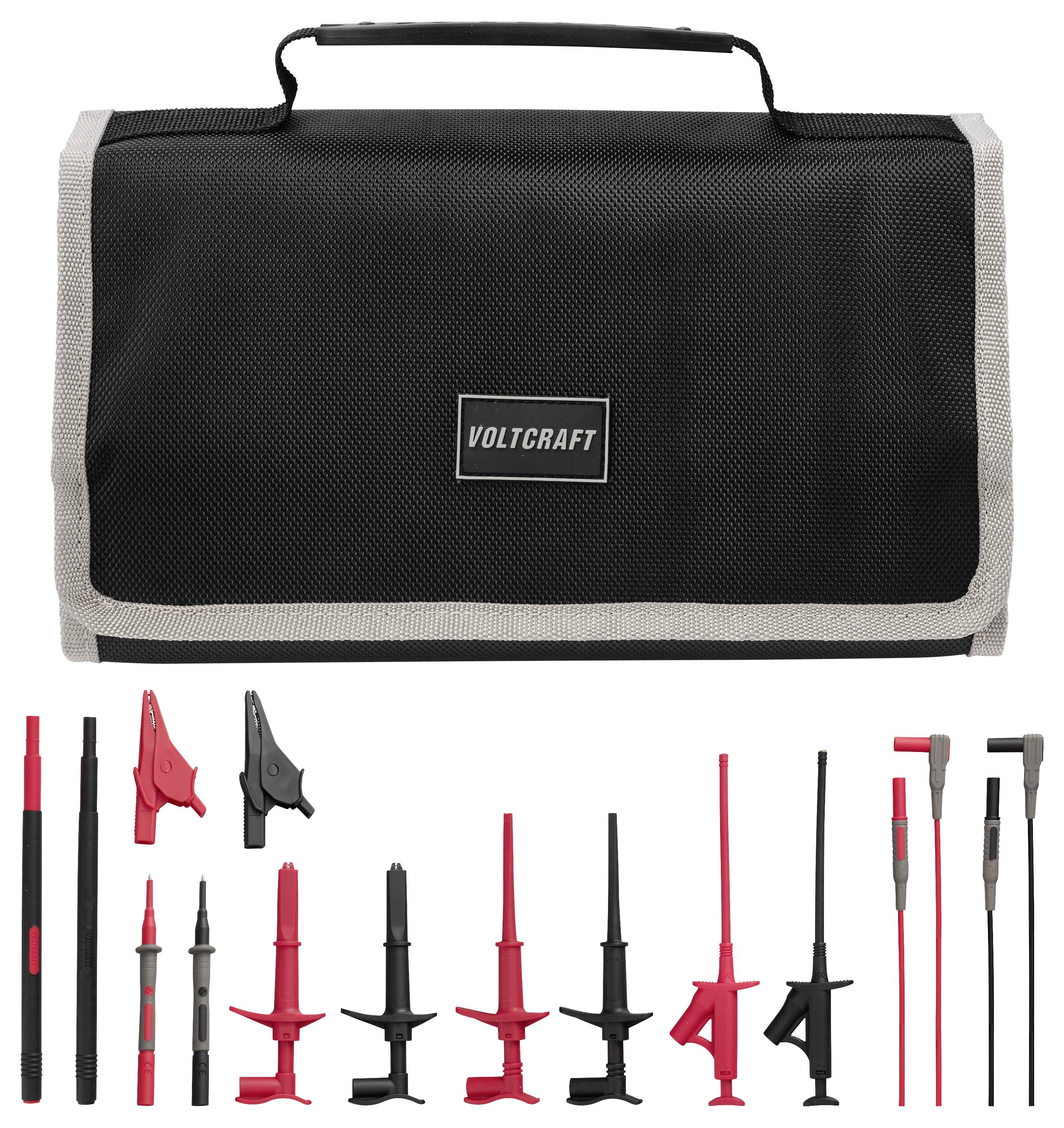 Voltcraft Transportkoffer mit einem Set aus roten und schwarzen Messspitzen und klemmstil-Messleitungen, die darunter angeordnet sind.