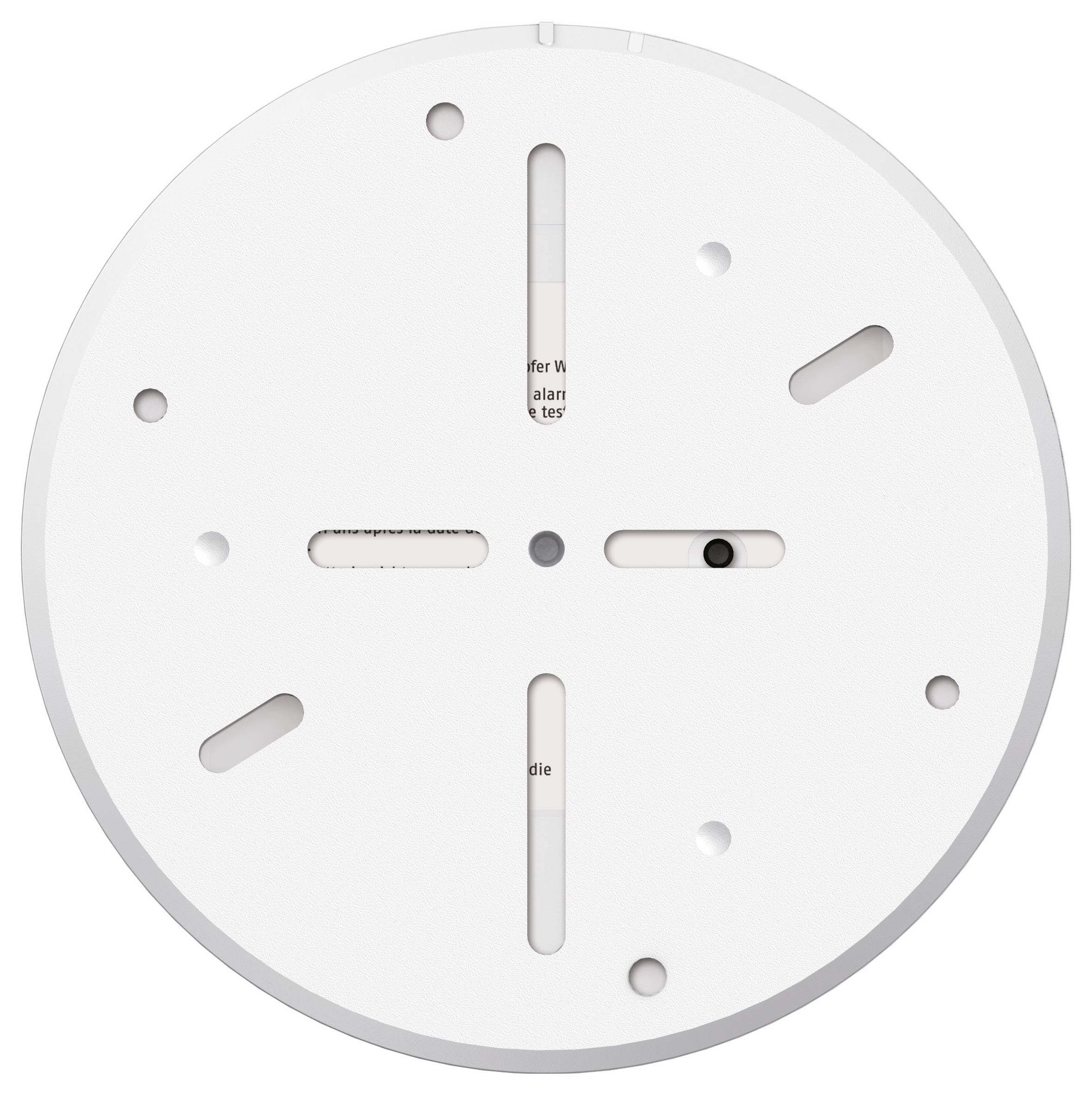 Eine runde, weiße Kunststoffplatte mit mehreren Schlitzen und Löchern, vermutlich Teil einer Halterung oder Befestigungsvorrichtung.