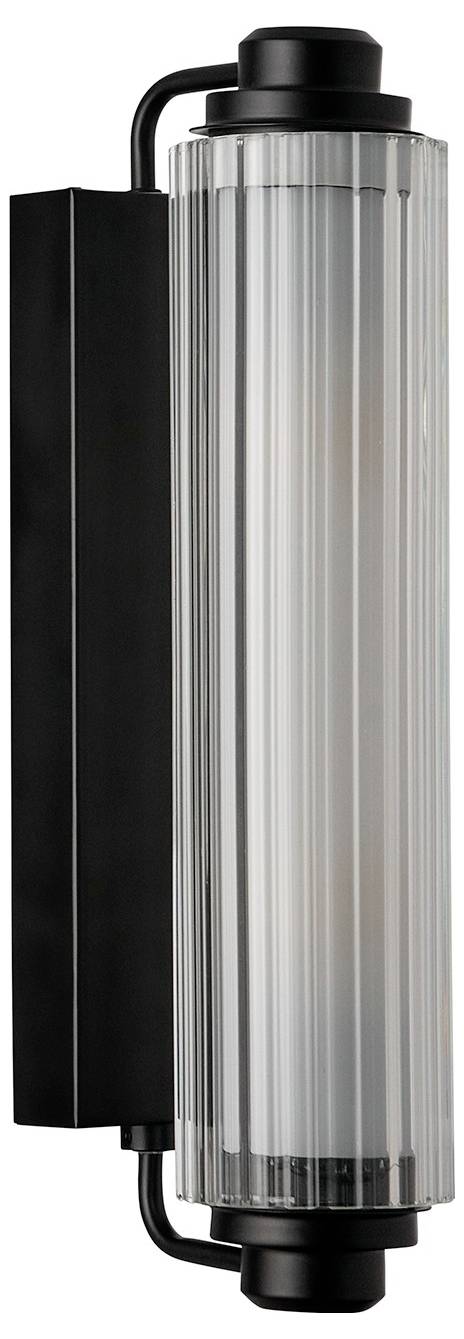Eine vertikal an der Wand montierte Leuchte mit schwarzer Basis und länglichem geripptem Glaszylinder, entwickelt für moderne Innenbeleuchtung.