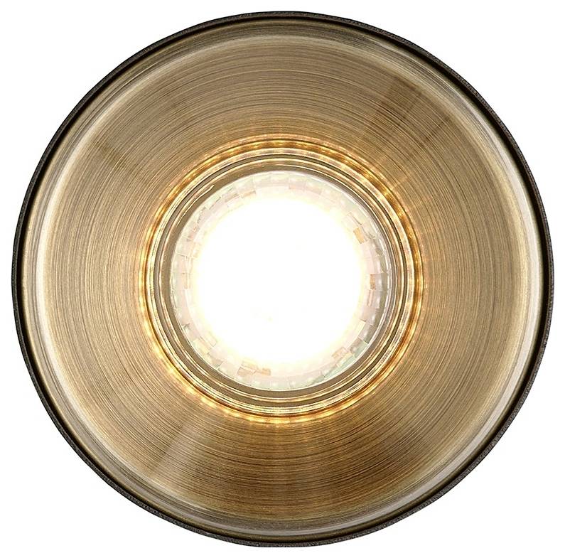 Draufsicht auf eine leuchtende, kreisförmige LED-Leuchte in Bronzefarbe mit leuchtendem Zentrum, das warme, radiale Ausstrahlung abgibt.