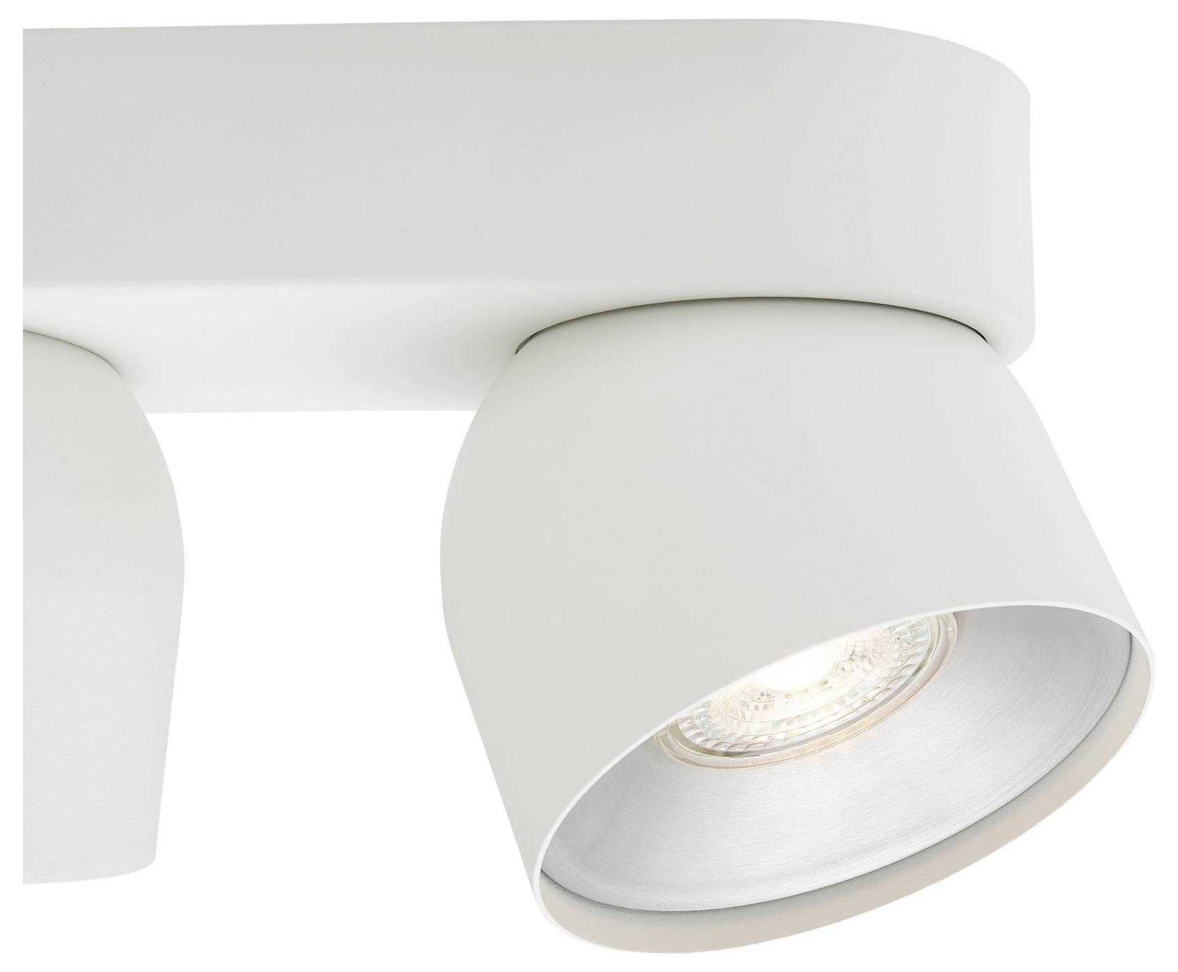 Eine Nahaufnahme eines modernen, weißen Deckenspots mit seiner Glühbirne und schlankem Design.