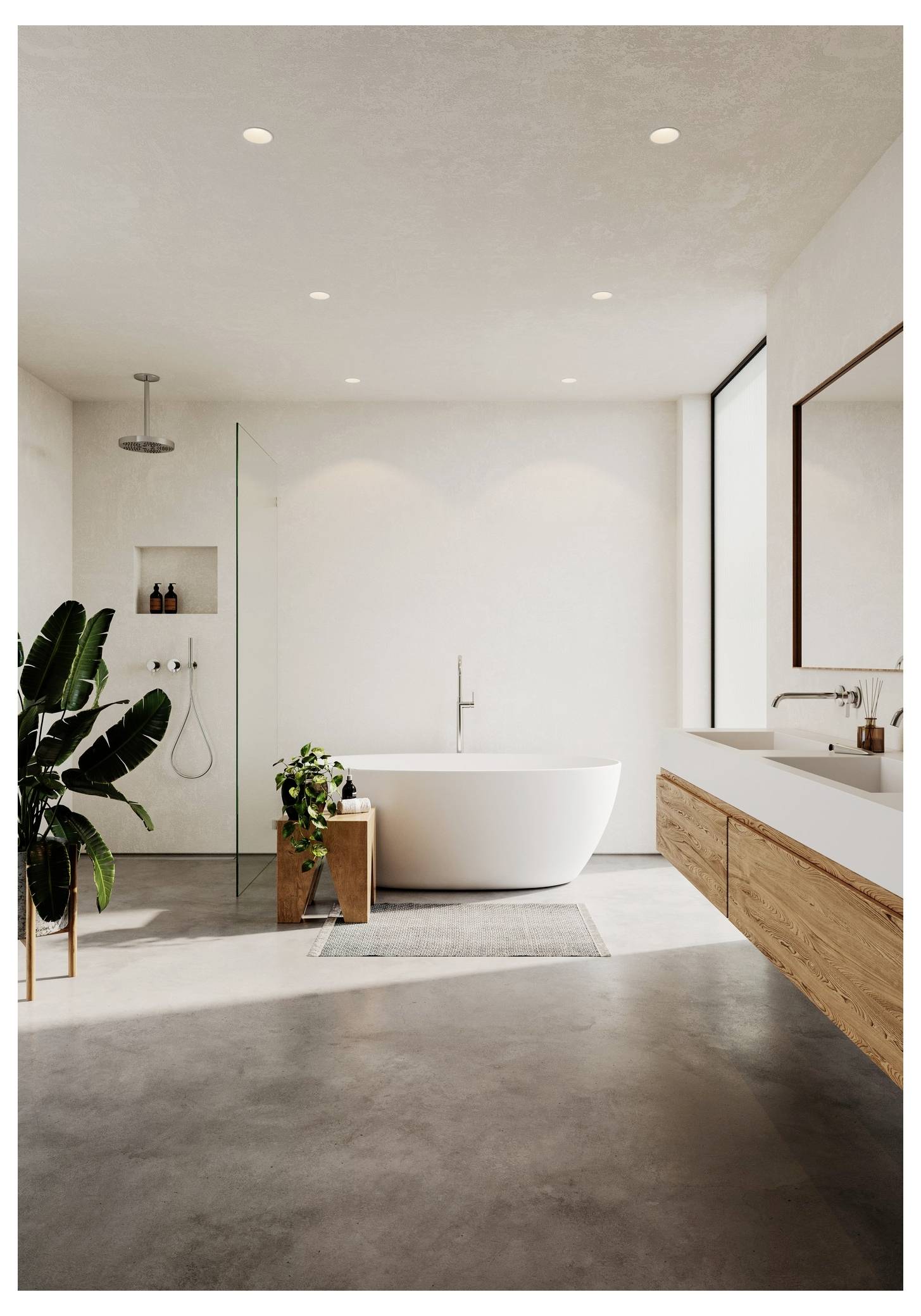Minimalistisches Badezimmer mit freistehender Badewanne, begehbarer Dusche, hölzernem Waschtisch, großem Spiegel und Topfpflanzen auf Betonboden.