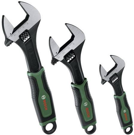 Drei verstellbare Schraubenschlüssel in verschiedenen Größen mit schwarzen und grünen Griffen, präsentiert vor weißem Hintergrund.