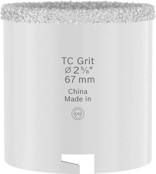 Eine Nahaufnahme eines weißen zylindrischen Werkzeugs mit der Beschriftung „TC Grit Ø 2⅝