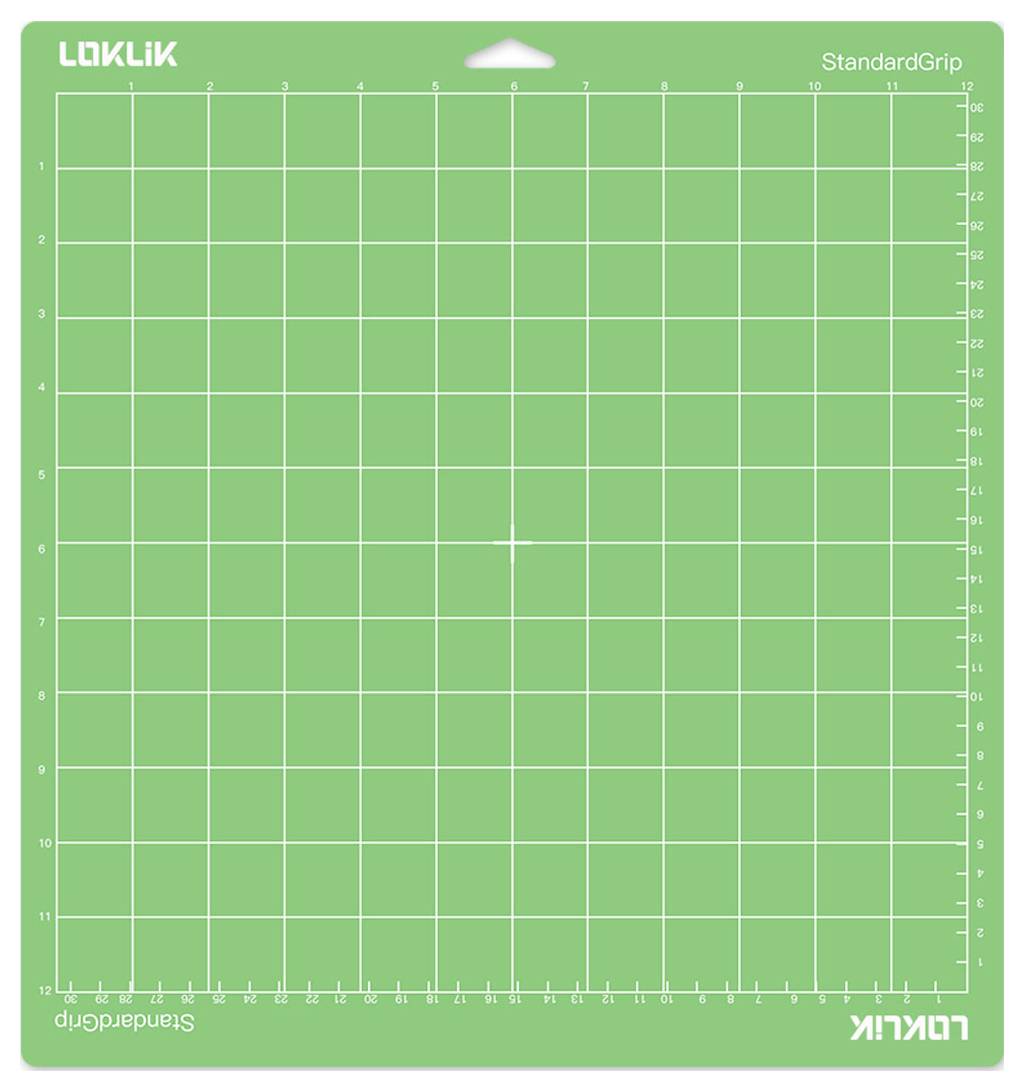 Eine grüne Loklik StandardGrip Schneidematte mit einem Rastermuster und Maßangaben an den Kanten.