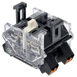 Ein durchsichtiger mechanischer Schalter mit durchscheinendem Gehäuse und zwei schwarzen Anschlüssen an der Basis, die interne Komponenten und einen haptischen Schaltmechanismus zeigen.